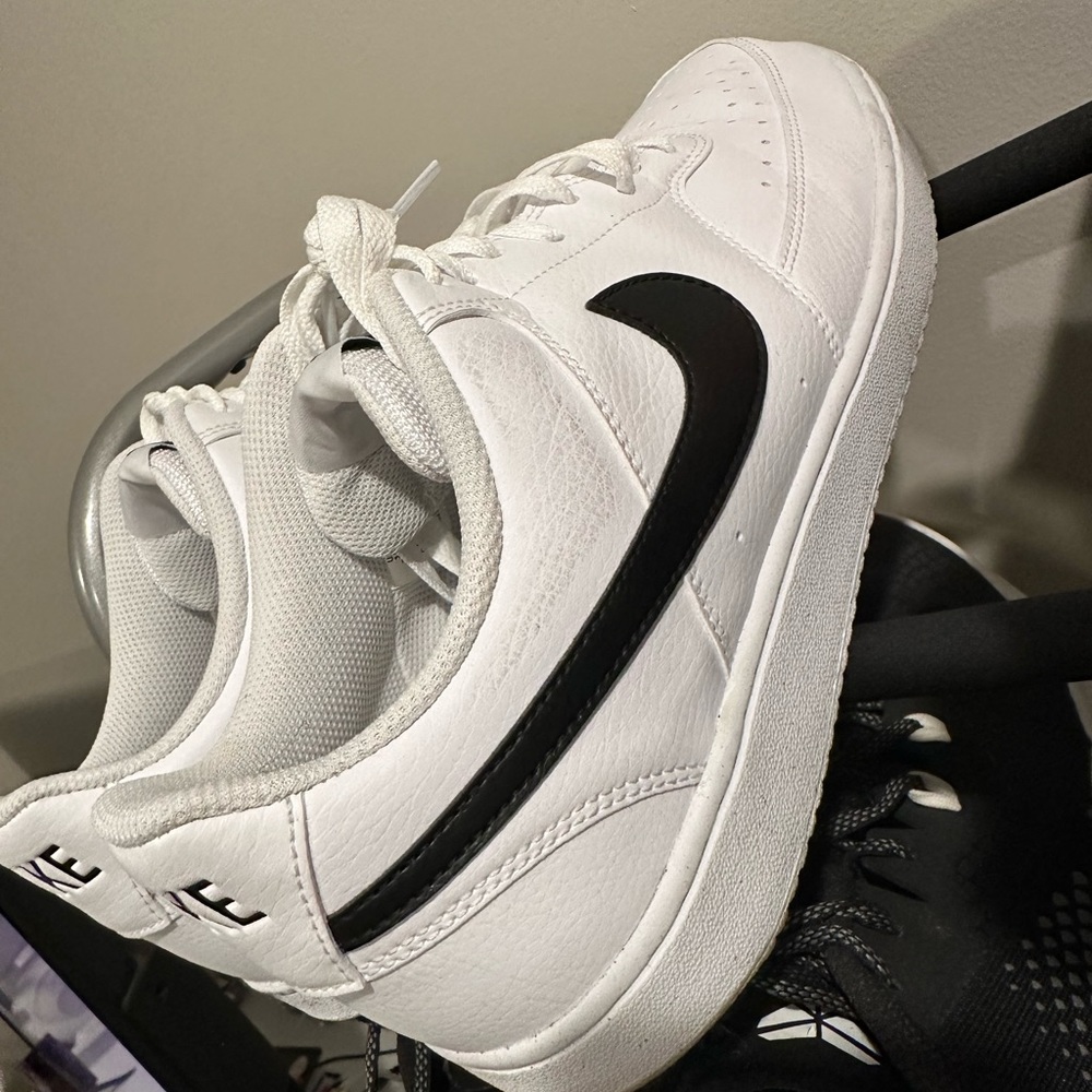 Men’s size 12 in shoes and women’s size 8 black slip on vans